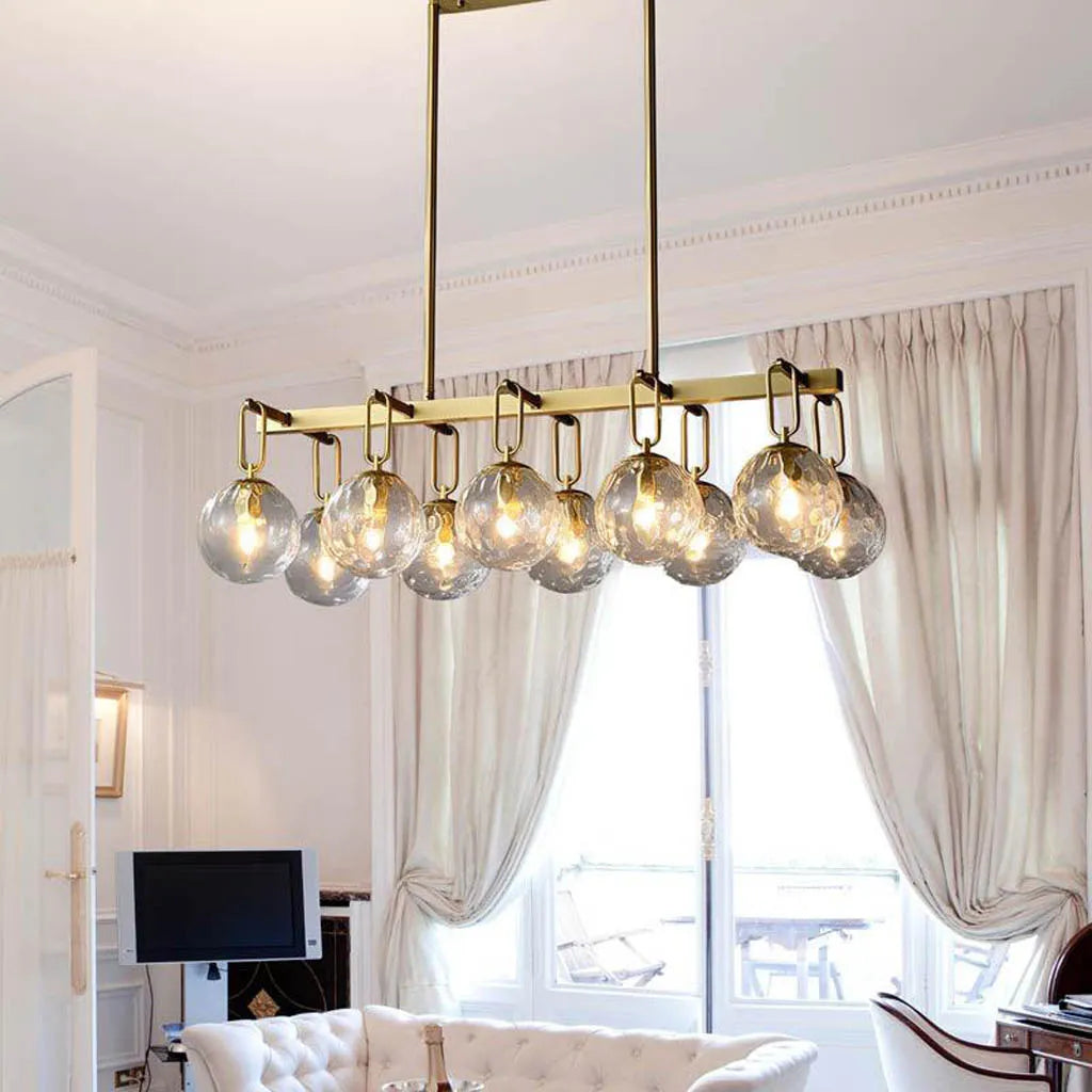 Chandeliers with Adjustable Arms for Directional LightingAuric Globe Brass Finish Luxe Chandelier (6012/10)