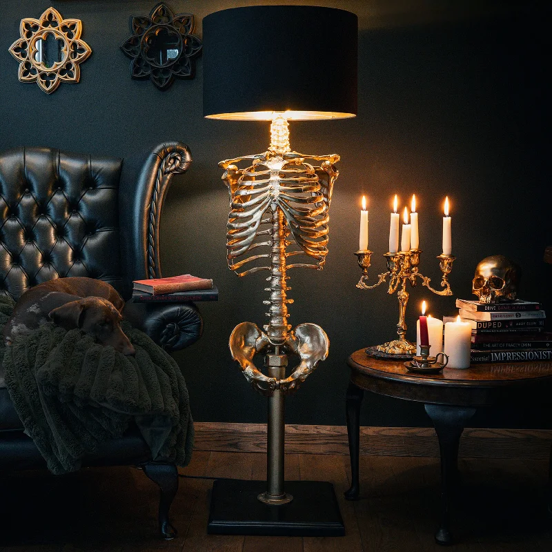 Marble Base Floor Lamp for a Touch of LuxuryThe Gold Skeleton Floor Lamp by The Blackened Teeth